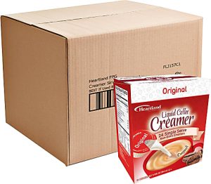 Box of Heartland original liquid coffee creamer next to a shipping carton. Contains 24 single-serve packs.