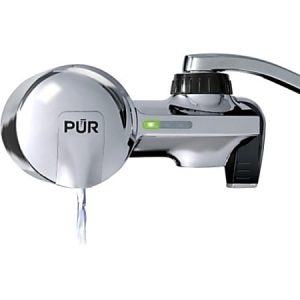 PUR faucet water filter in chrome finish with water flowing and an indicator light.
