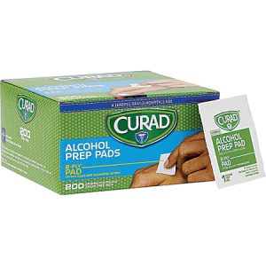 Box of Curad alcohol prep pads with one pad sachet. Label reads "2-ply pad" and "200 count.