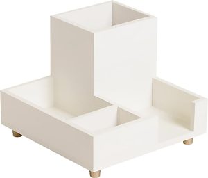 White, minimalist desktop organizer with four compartments and wooden legs.