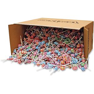 Open cardboard box spilling assorted colorful lollipops with various wrappers and stick handles.