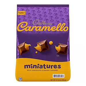 Cadbury Caramello Miniatures bag with milk chocolate and creamy caramel pieces on purple and yellow packaging.