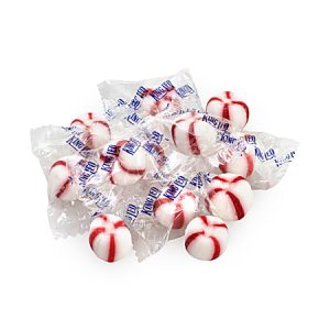 Individually wrapped peppermint candies with red and white stripes, labeled "King Leo," arranged in a pile.