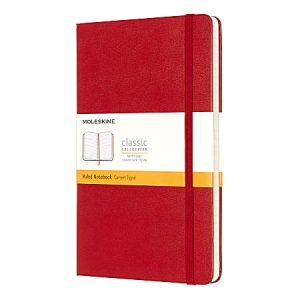 Red Moleskine notebook with elastic band and label, featuring ruled pages.
