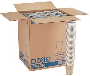 Open box of Dixie paper hot cups, showing sleeves inside, with a stack of cups standing next to the box.