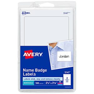 Avery Name Badge Labels pack with removable labels, 100 count, measuring 2⅓" x 3⅜", model 5147, displayed in packaging.