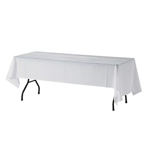 Rectangular table with a wrinkle-free white tablecloth, draped to cover the sides and corners, on black metal legs.