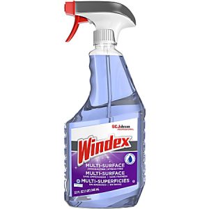 Windex Multi-Surface cleaner bottle with red spray nozzle, containing 32 oz of solution for various surfaces.
