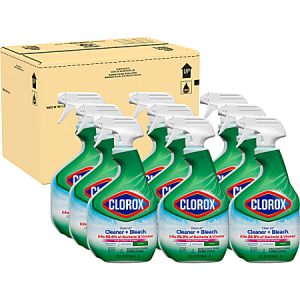 Nine Clorox Cleaner + Bleach spray bottles in front of a cardboard shipping box.