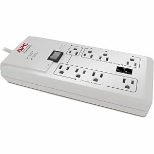 White APC surge protector with six outlets, a power switch, and two indicator lights.