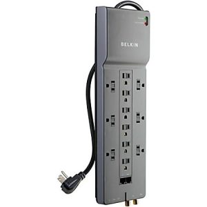 Belkin power strip with 12 outlets and a black cord, featuring surge protection and a compact, vertical design.