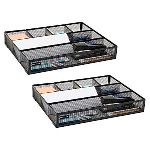 Two black metal desk organizers with multiple compartments, holding notepads, envelopes, and pens.