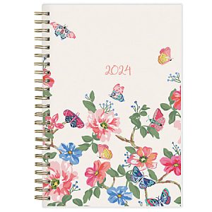 2024 planner with floral and butterfly design on a white cover, featuring pink and blue flowers.