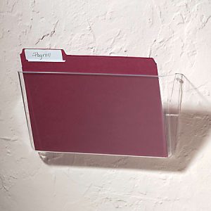Red file folder labeled "Payroll" in a clear wall-mounted holder on a textured white wall.