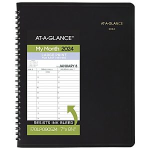 Black spiral-bound 2024 planner with a large print monthly calendar, featuring the first week of January and ink-resistant pages.