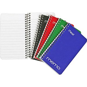 Five spiral-bound memo notebooks in blue, red, green, black, and white, with one open to show lined pages.