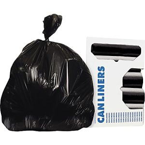Black garbage bag next to a box of can liners with visible rolls inside.
