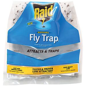 Raid Disposable Fly Trap packaging, featuring lure attractant; highlights its effectiveness in attracting and trapping flies.