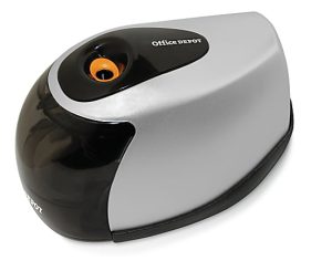 Electric pencil sharpener with black and gray body, featuring a visible orange sharpener hole.