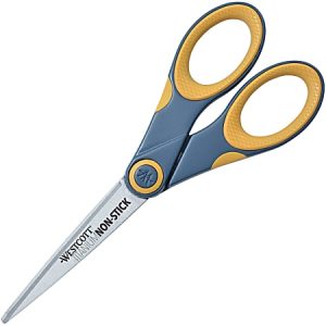 Non-stick scissors with blue and yellow ergonomic handles, laying on a white background.