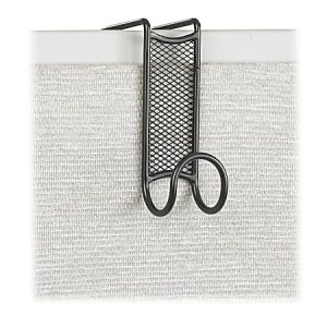 Mesh metal hook hanging over a gray fabric-covered office divider.