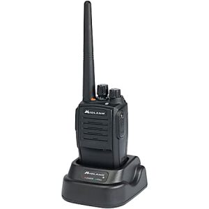 A black Midland walkie-talkie with an antenna on a charging base, featuring control knobs and display panel.
