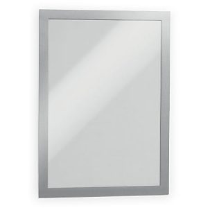 Rectangular silver-framed mirror with a sleek, modern design, reflecting a light-colored surface.