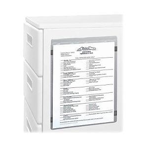 Document holder attached to a filing cabinet, displaying an inspection sheet with checklist items and details.