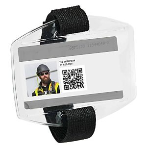Clear ID badge with a strap, displaying a bearded man in safety gear, QR code, and text with a name and date.