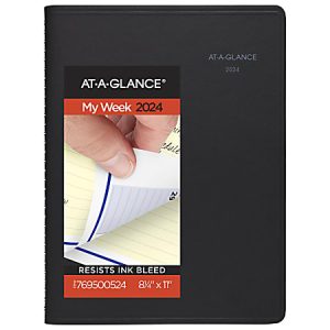 Black 2024 AT-A-GLANCE planner with a cover illustration showing a hand flipping the pages. Resists ink bleed.