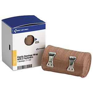 Elastic bandage wrap with two metal fasteners beside its packaging box labeled "First Aid Only.