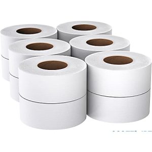 Eight large rolls of white paper towels stacked in two rows.