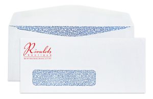 White envelope with blue floral interior, featuring "Rivulets boutique" logo and address window displaying a blue pattern.