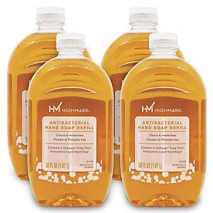 Four bottles of Highmark antibacterial hand soap refill, 50 fl oz each, with orange liquid, labeled as clean and invigorating.