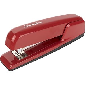 Red Swingline stapler on a white background, showcasing its sleek and classic design.